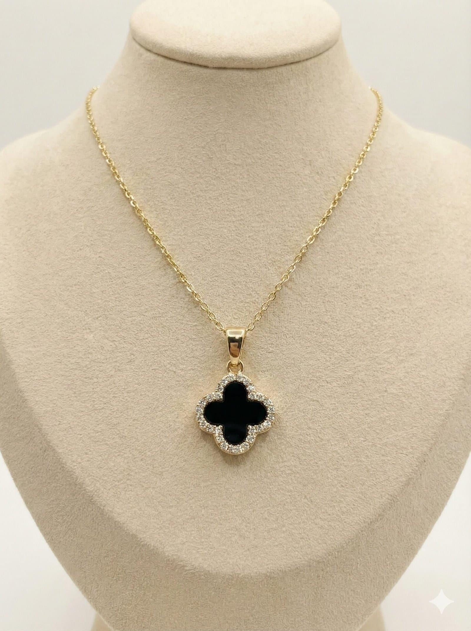 Gold-Tone Quatrefoil Pendant Necklace with Black Inlay and Crystal Halo — image 1