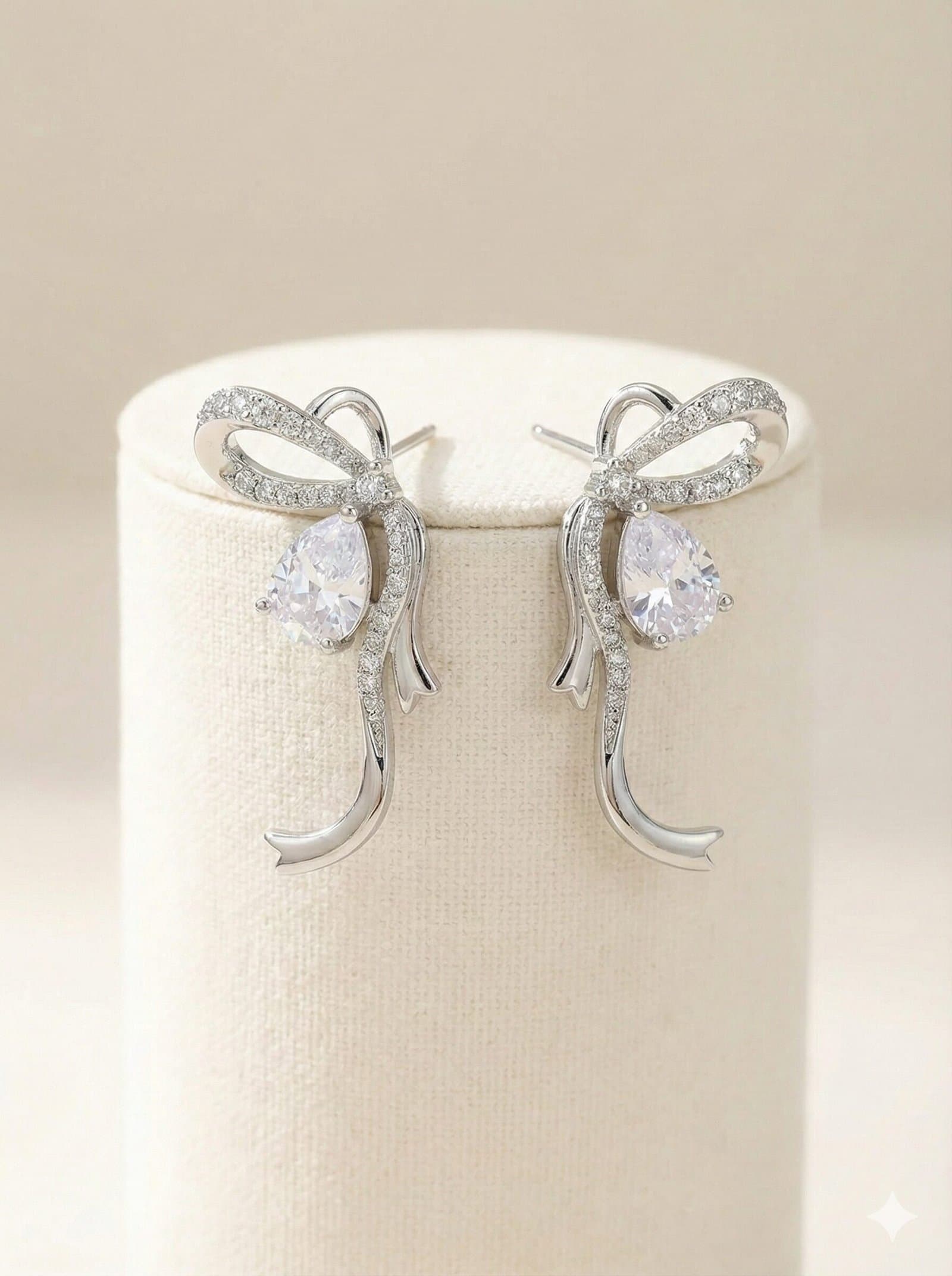 Silver-Toned Pave Ribbon Bow Stud Earrings with Pear-Cut Stone Accent — image 4