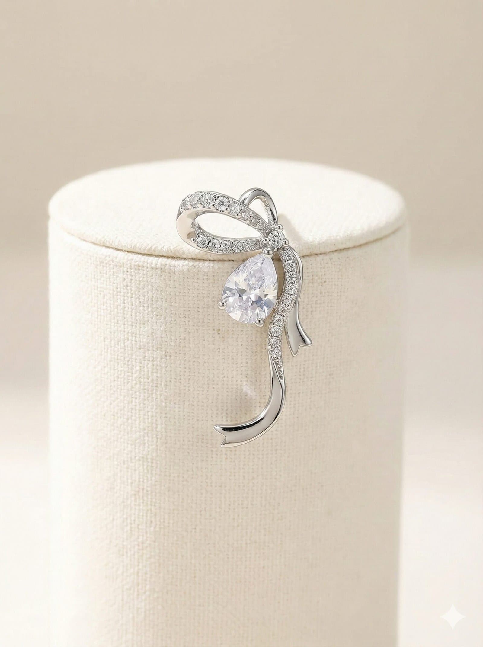 Silver-Toned Pave Ribbon Bow Stud Earrings with Pear-Cut Stone Accent — image 3