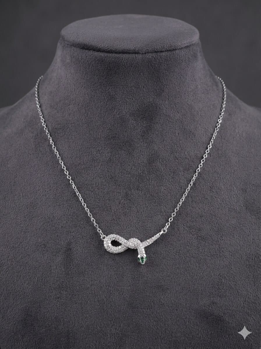 Silver-Tone Coiled Snake Pendant Necklace with Clear Pavé Stones and Green Accents — image 2