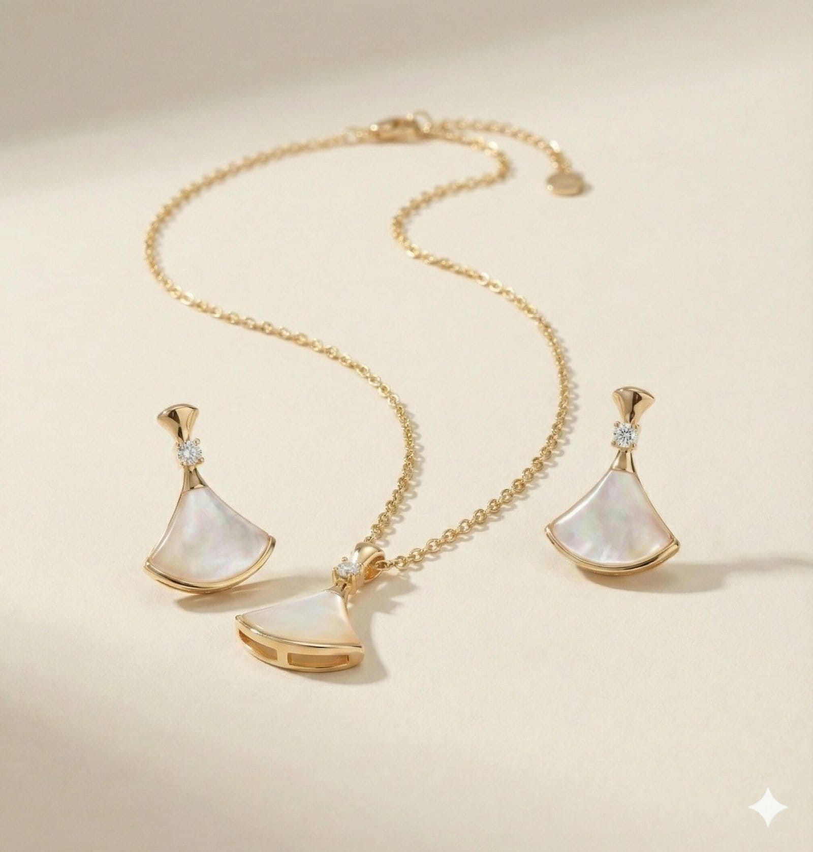 Gold-Tone Fan Motif Necklace and Earring Set with Pearlescent Inlay and Clear Stone Accents