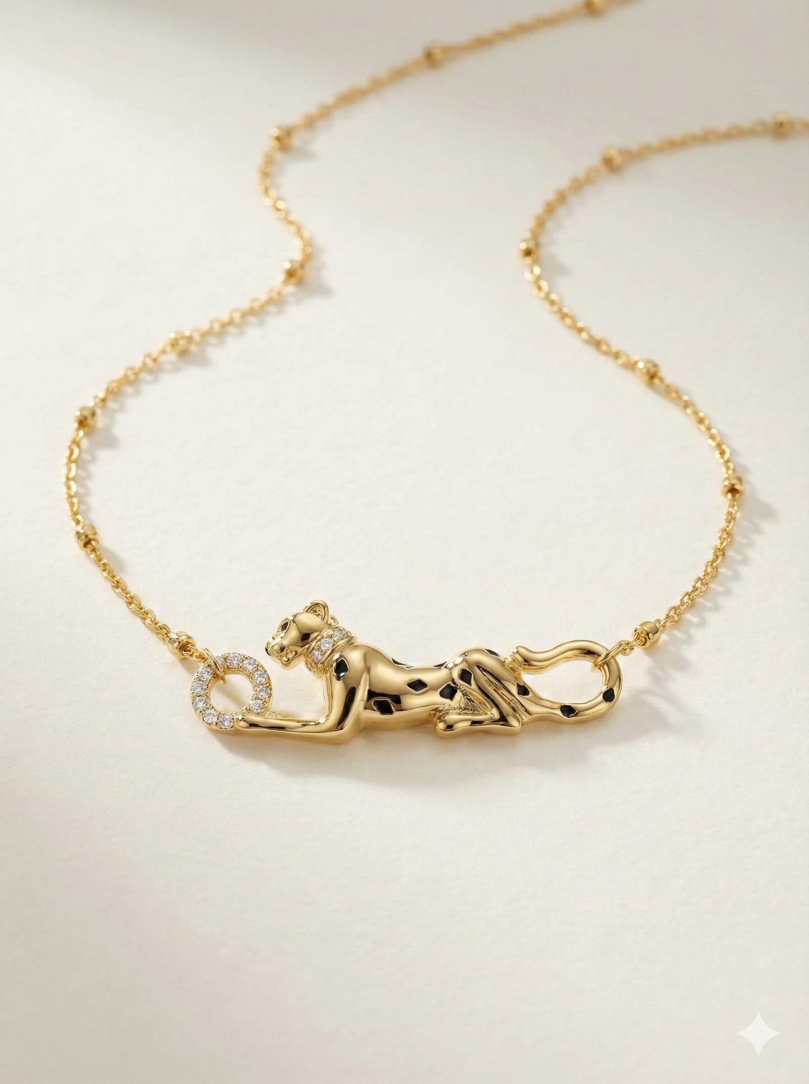Gold-Tone Sculpted Panther Pendant Necklace with Crystal Accents and Beaded Chain