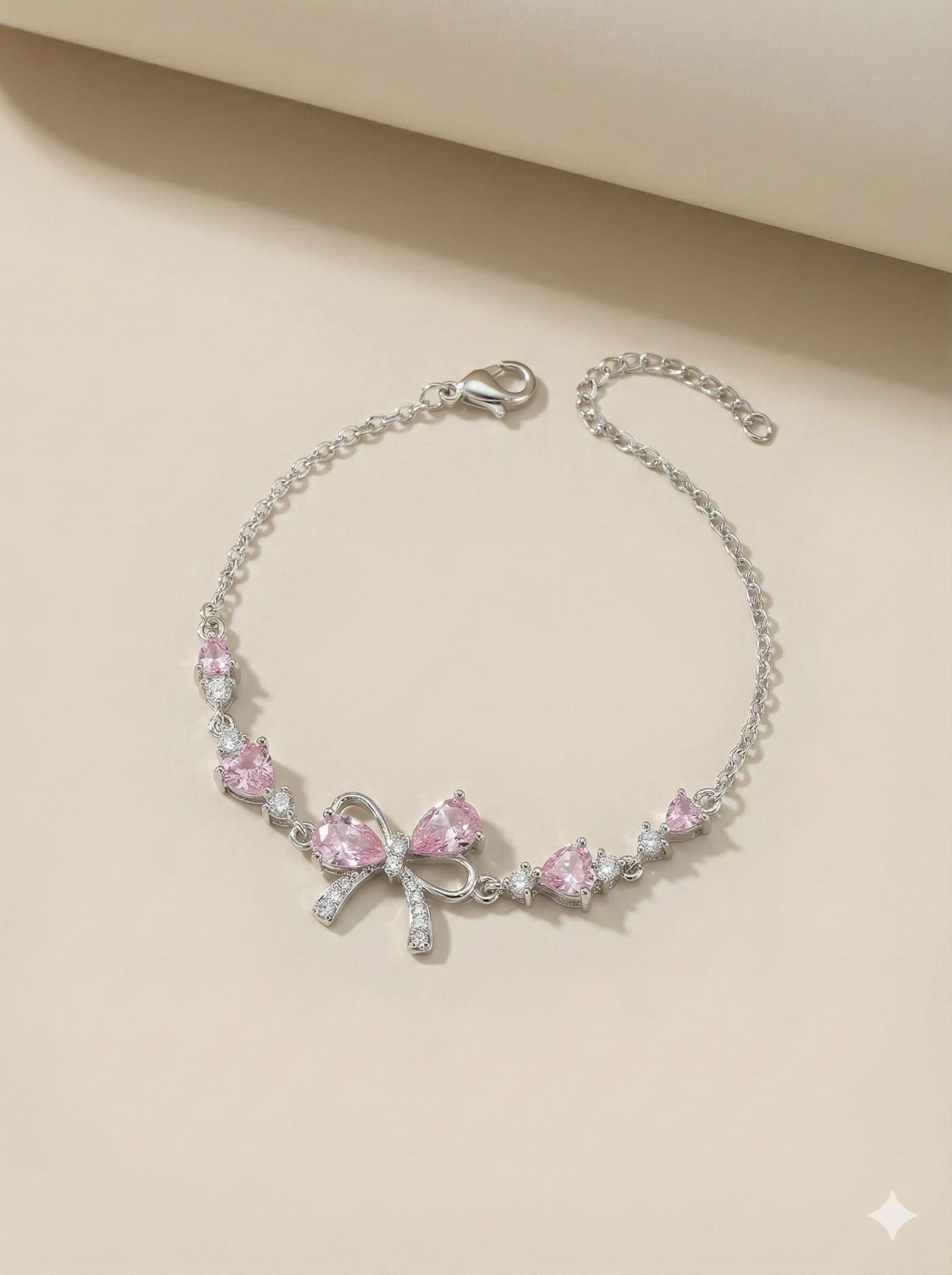 Silver-Tone Delicate Chain Bracelet with Pink Stone Bow Motif and Crystal Accents